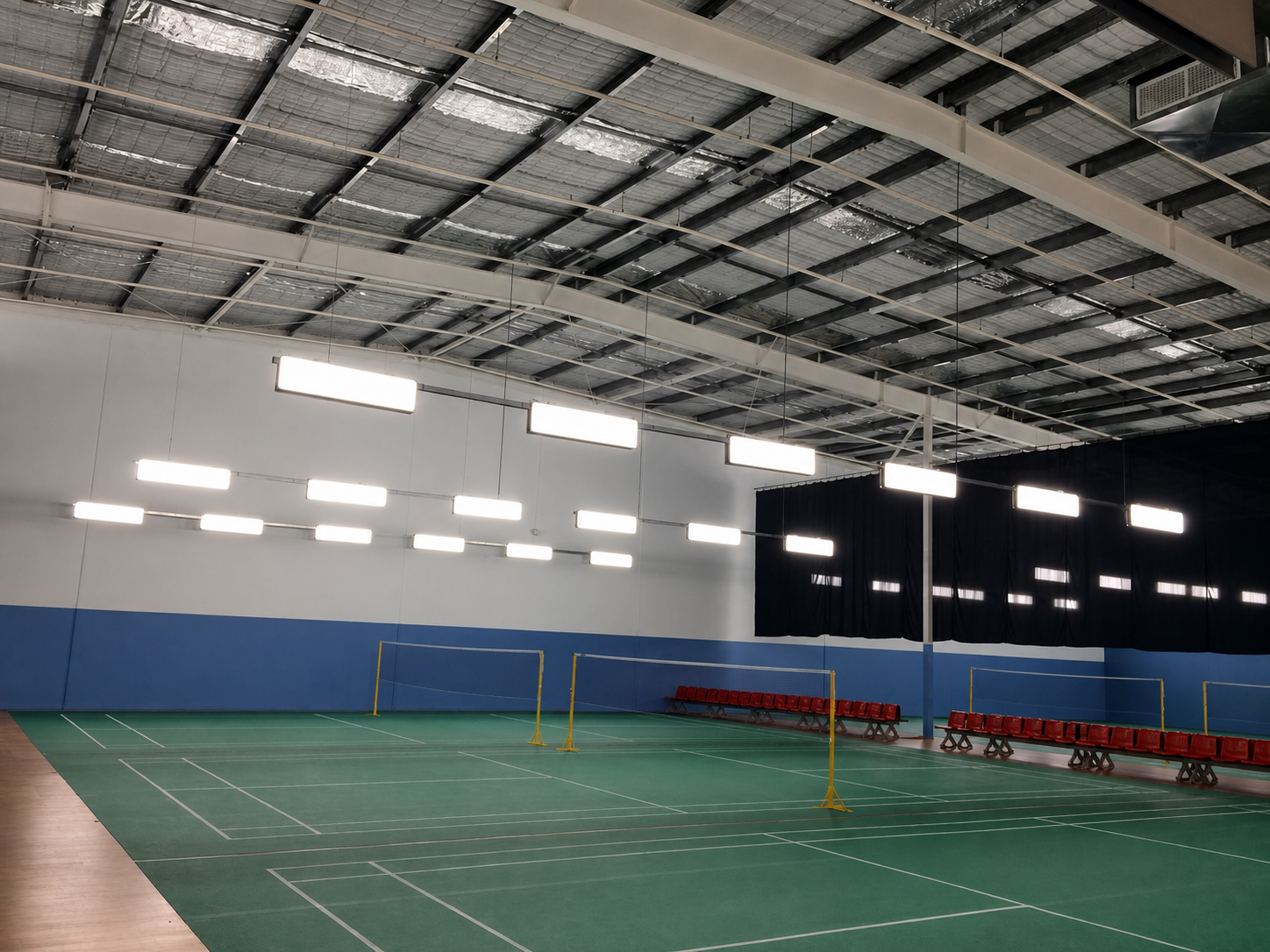 Commercial indoor facility with suspended LED lighting